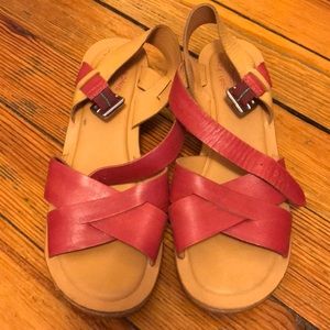 Comfy and cute kork-ease two-tone leather sandals.